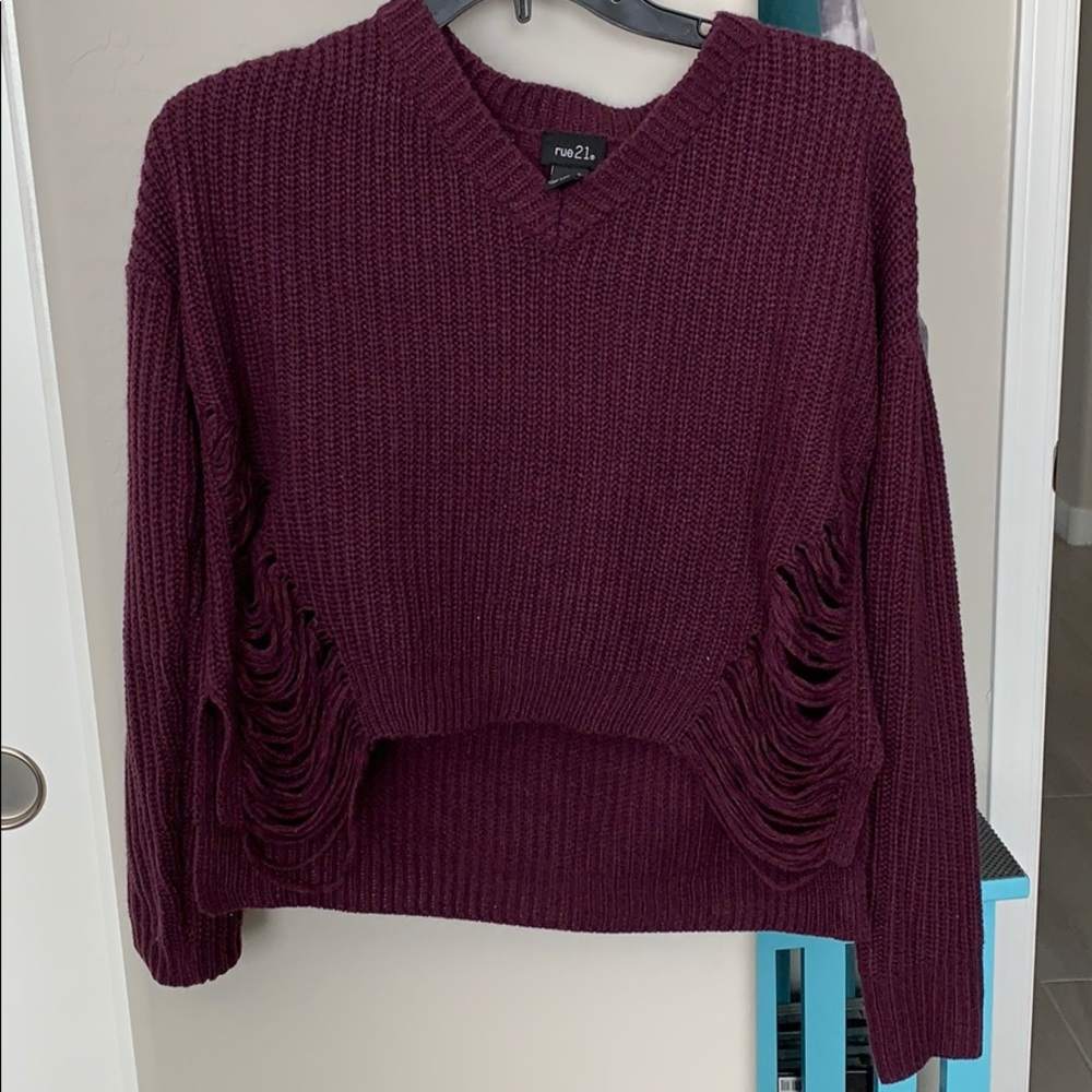 Ripped sweater